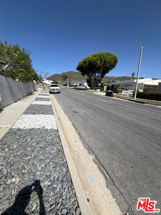 3900 Castlerock Road Malibu, CA 90265 - Photo 51 of 52 a view of a parking space with a car parked