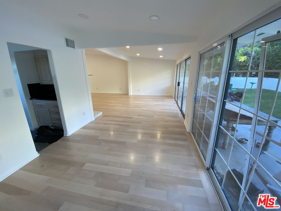 3900 Castlerock Road Malibu, CA 90265 - Photo 9 of 52 a view of entryway with wooden floor