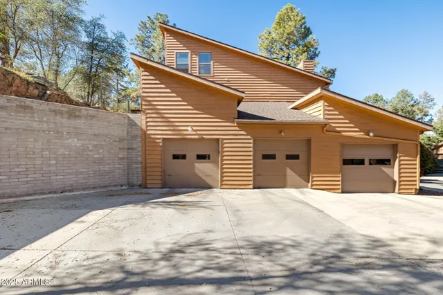 a view of a tree in a yard