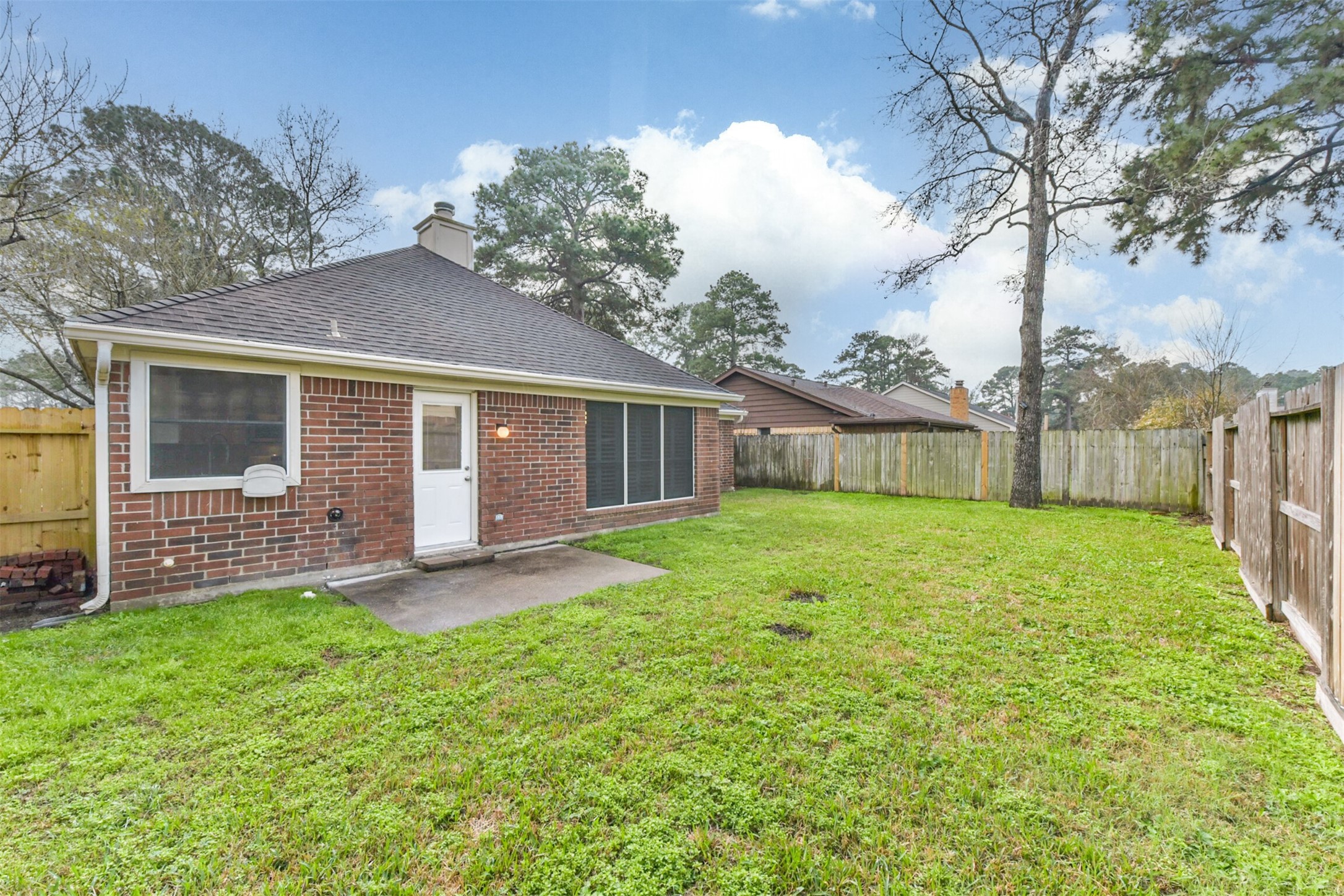 9202 Bayou Bluff Drive Spring, TX 77379 - Photo 28 of 33 a view of a house with a yard and sitting area