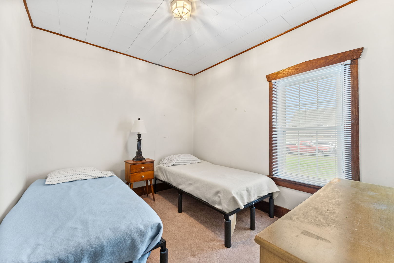313 1st Avenue Silvis, IL 61282 - Photo 12 of 23 a bedroom with two beds and painted walls