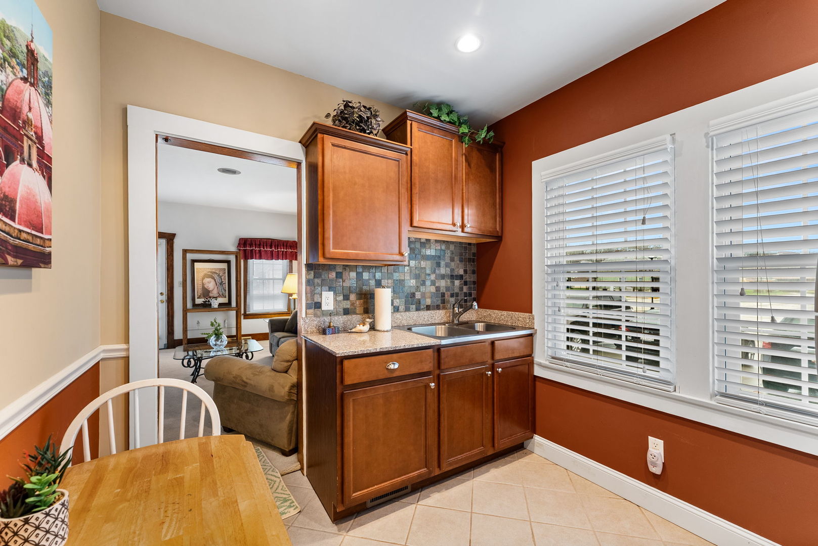 313 1st Avenue Silvis, IL 61282 - Photo 13 of 23 a view of a kitchen with a sink and cabinets