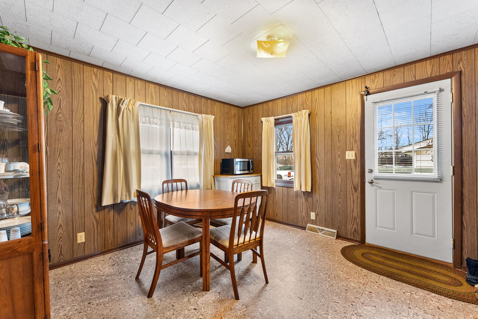 313 1st Avenue Silvis, IL 61282 - Photo 16 of 23 a dining room with furniture and window
