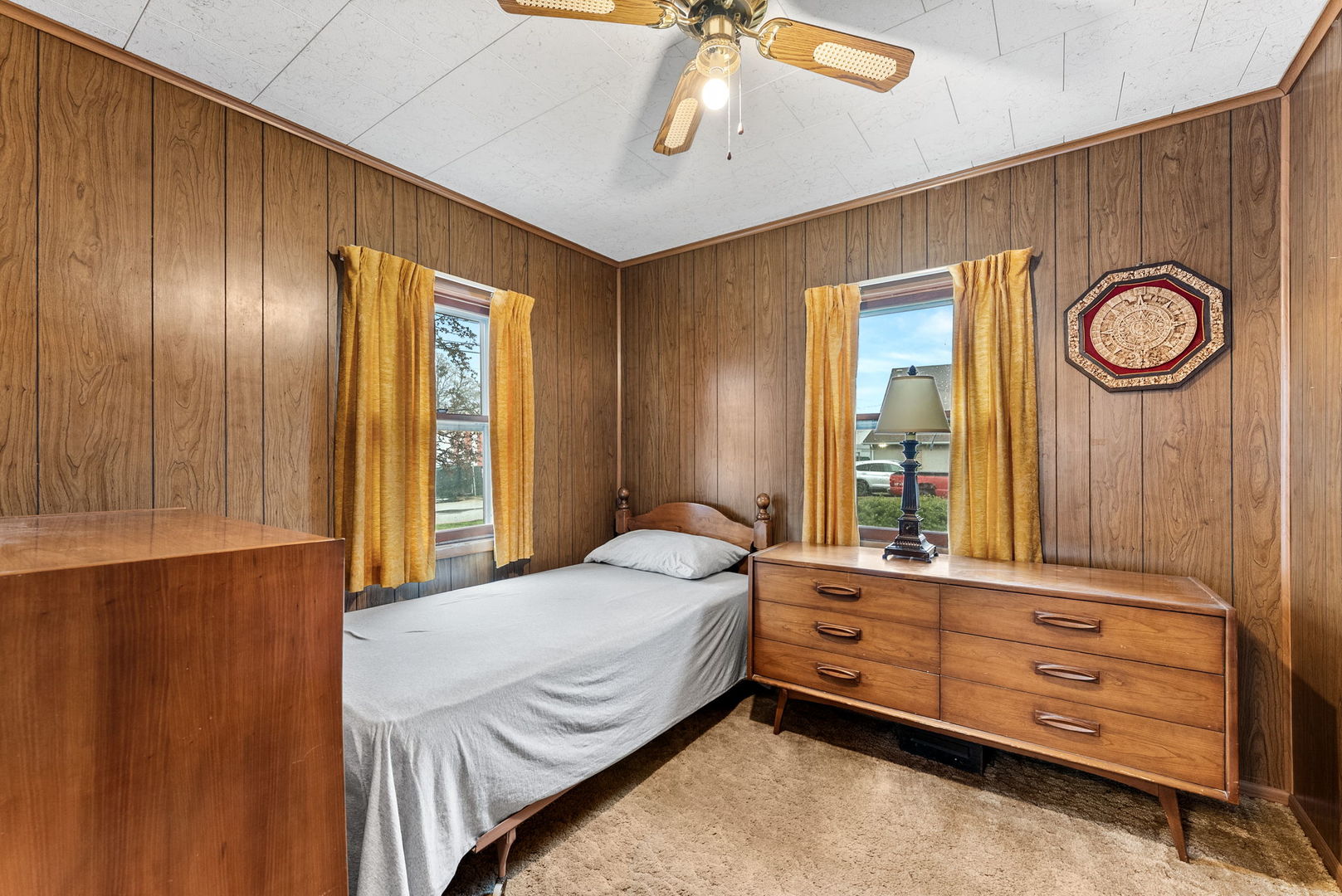 313 1st Avenue Silvis, IL 61282 - Photo 17 of 23 a bedroom with a bed and a closet