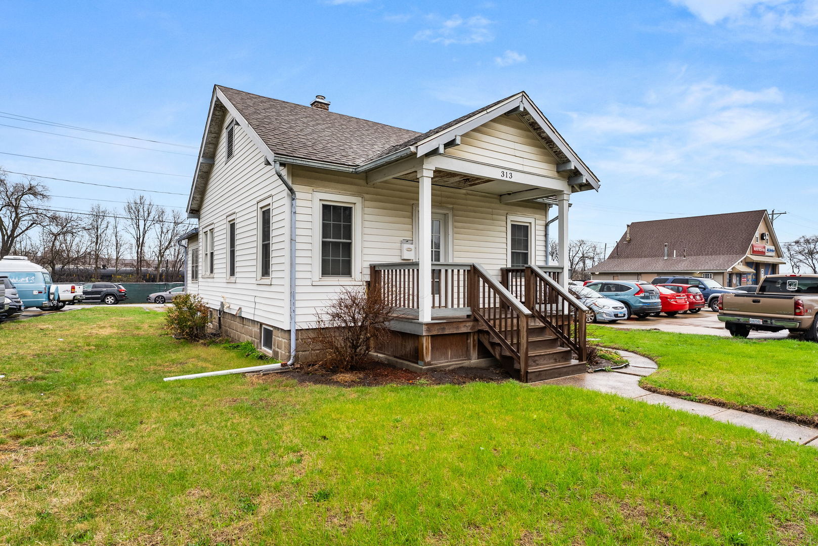 313 1st Avenue Silvis, IL 61282 - Photo 2 of 23 a view of a house with backyard