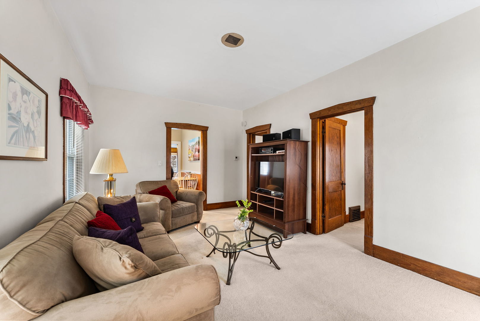 313 1st Avenue Silvis, IL 61282 - Photo 8 of 23 a living room with furniture and a window