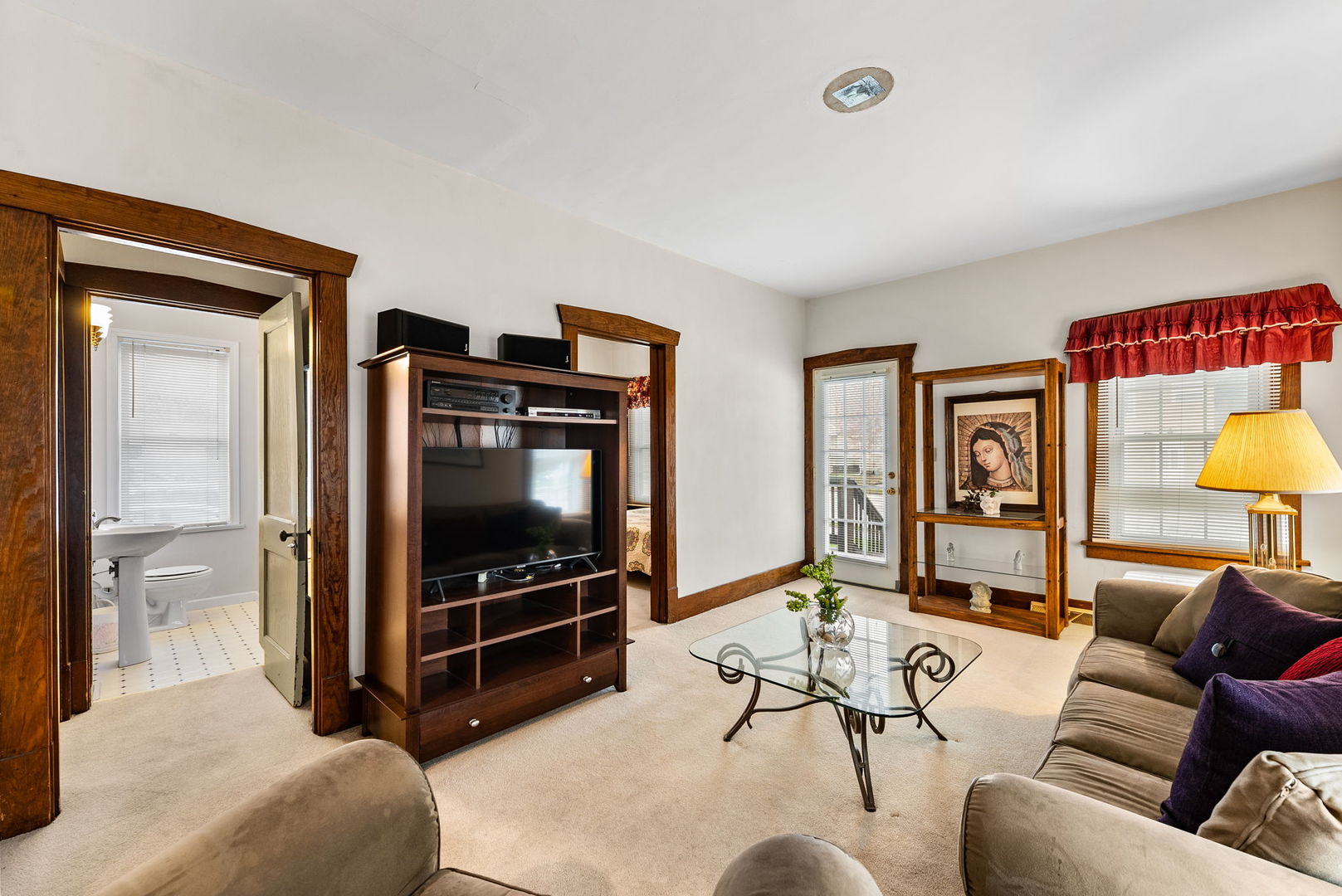 313 1st Avenue Silvis, IL 61282 - Photo 9 of 23 a living room with furniture and a flat screen tv