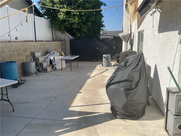 a view of a terrace with sitting area