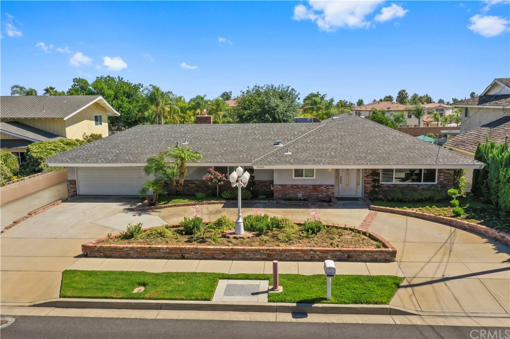 13355 Victoria Street Rancho Cucamonga, CA 91739 - Photo 1 of 1 a view of house with a yard