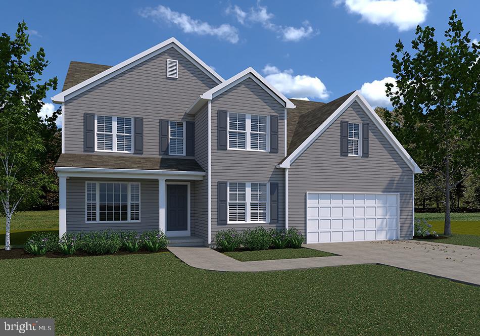 Cambridge Model At Eagles View York, PA 17406 - Photo 3 of 4 a front view of a house with a garden