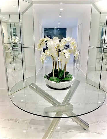 a vase of flowers sitting on a table