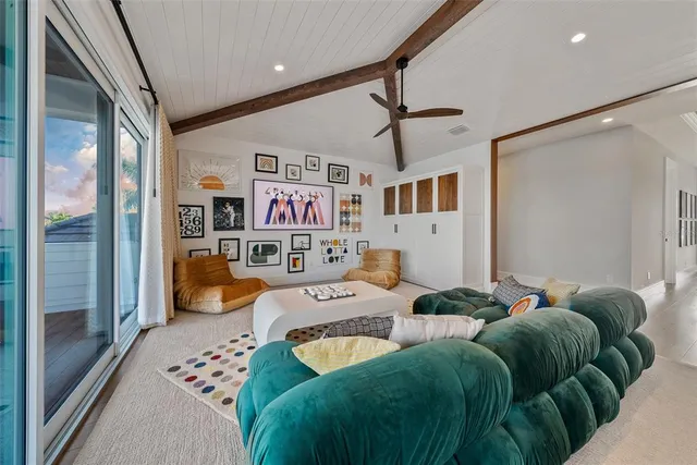 a front view of a house with a yard table and chairs