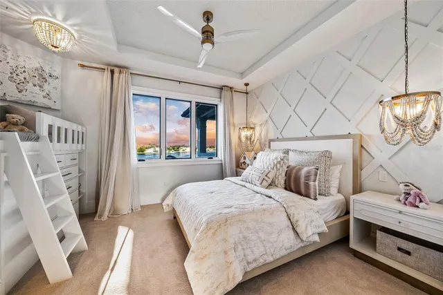 an aerial view of a house with a lake view