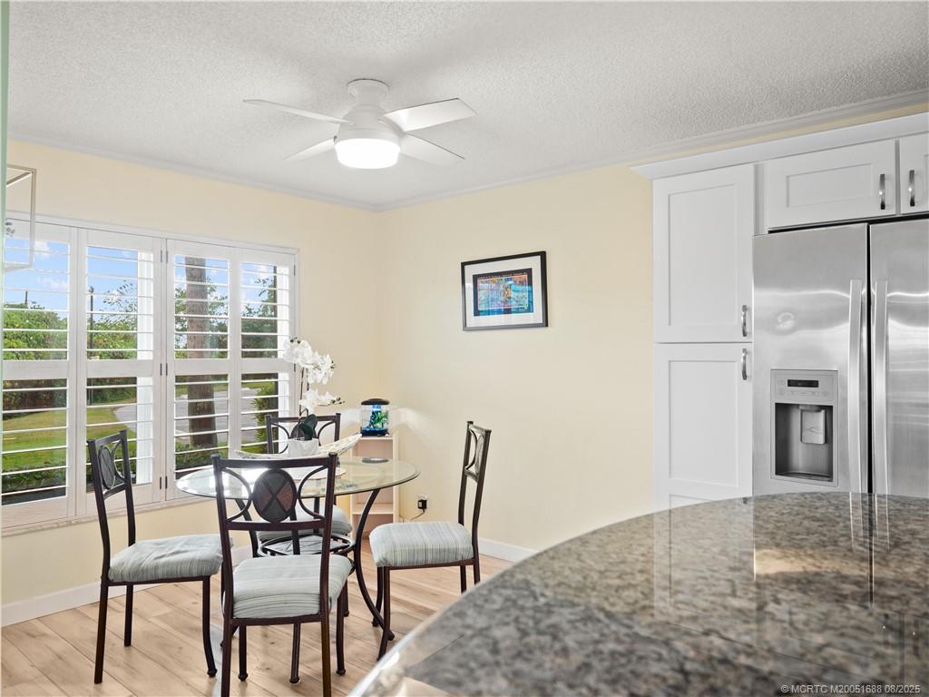 950 South Kanner Highway, Unit 101 Stuart, FL 34994 - Photo 16 of 32 a view of a livingroom with furniture and a window