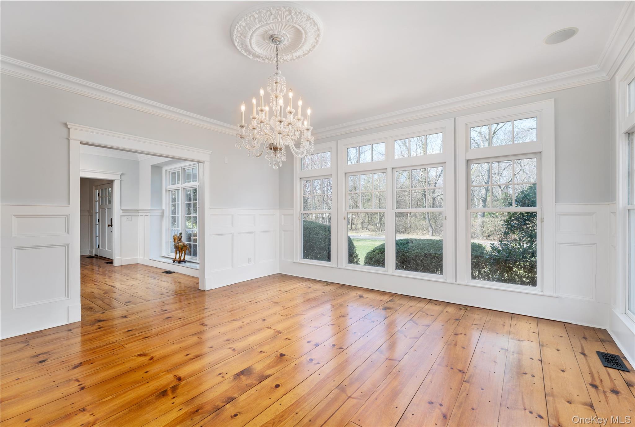 9 Old Field Road Setauket, NY 11733 - Photo 13 of 50 Formal Dining Room With Walls Of Windows & Custom Millwork Throughout.