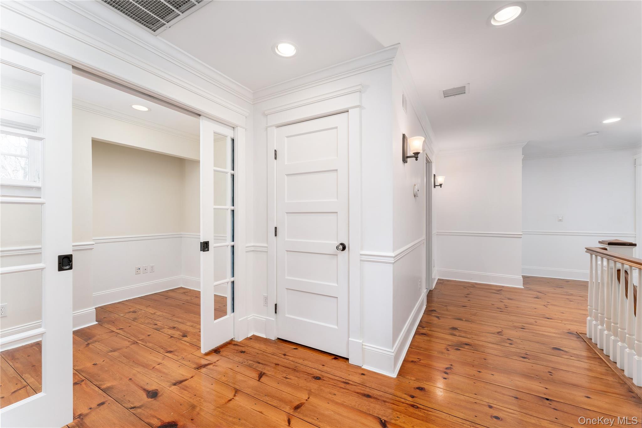9 Old Field Road Setauket, NY 11733 - Photo 31 of 50 Second Floor Hallway/Landing With Pocket Doors To Home Office.