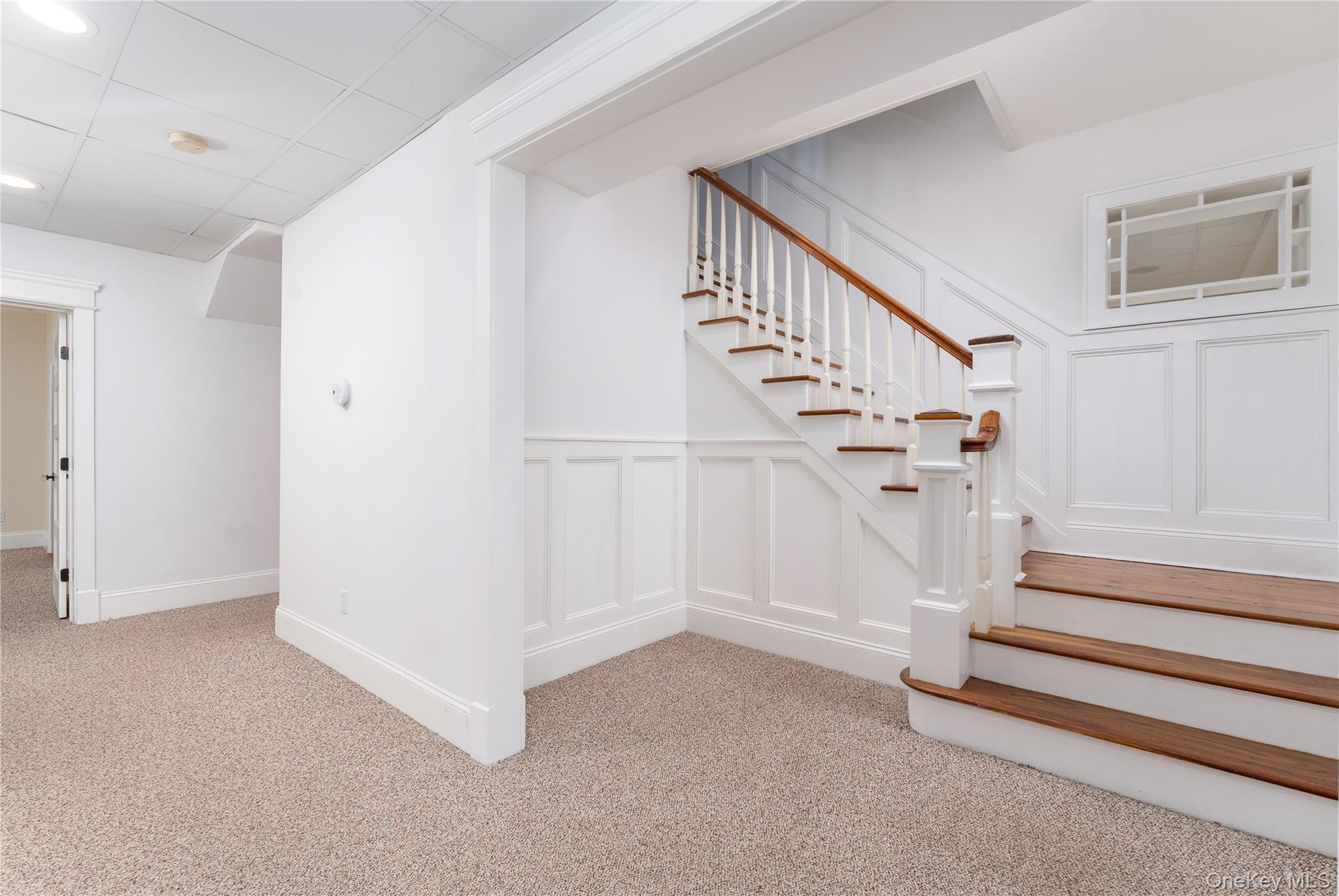 9 Old Field Road Setauket, NY 11733 - Photo 44 of 50 Custom Staircase To Finished Lower Level With Bedroom, Study, Playroom & Full Bathroom