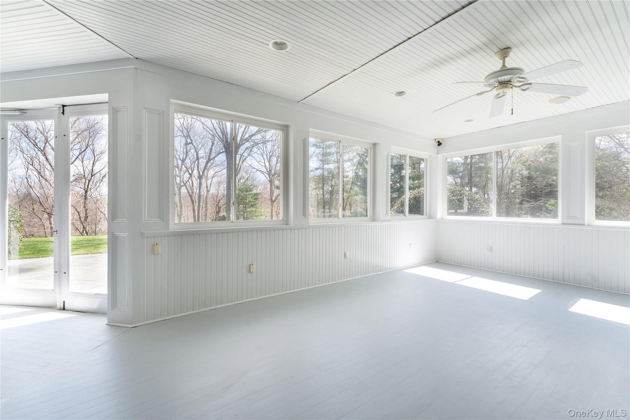 9 Old Field Road Setauket, NY 11733 - Photo 49 of 50 Enclosed 3 Season Porch Perfect For Entertaining!
