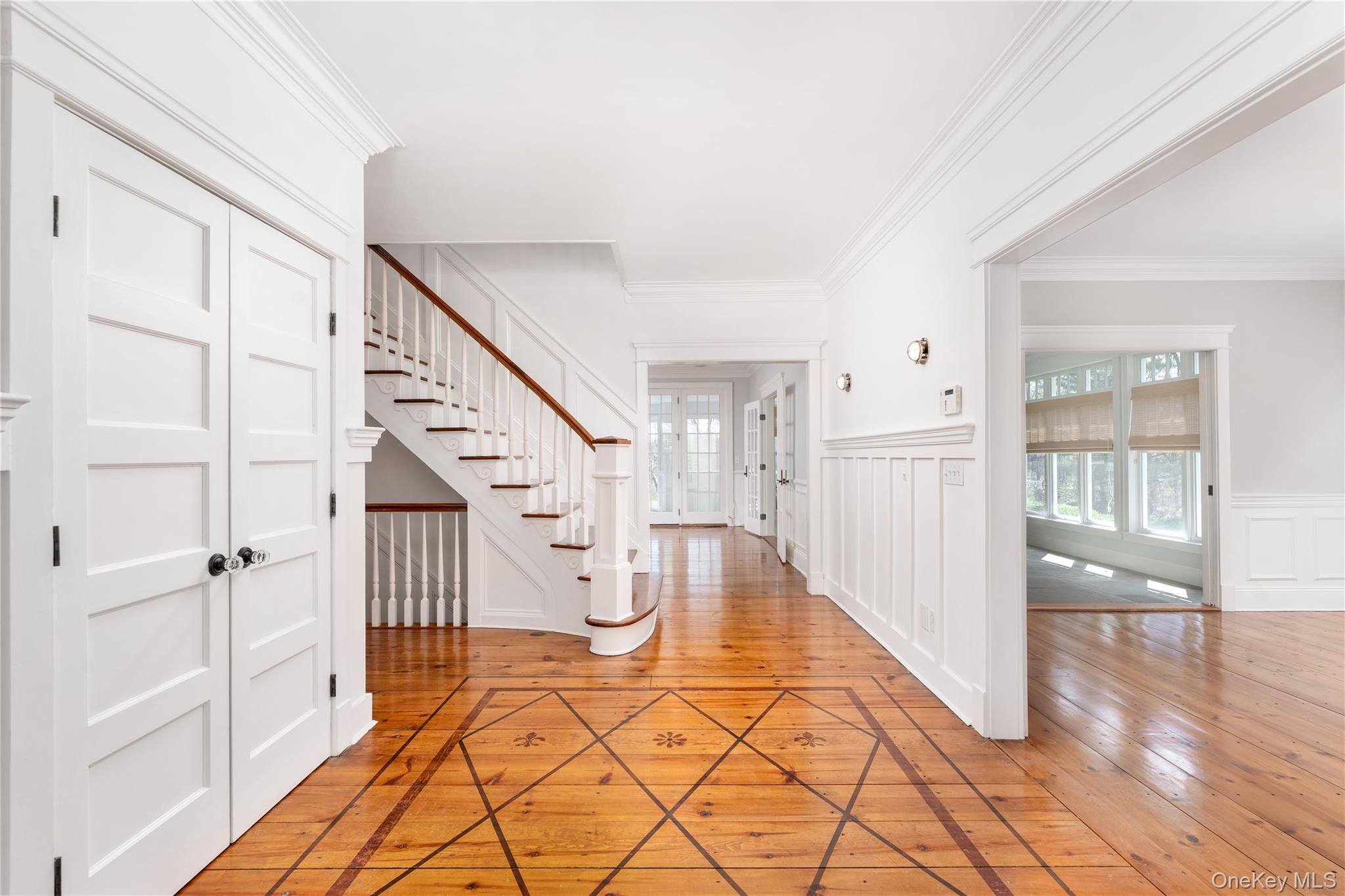 9 Old Field Road Setauket, NY 11733 - Photo 10 of 50 Welcoming Entry Foyer With Custom Staircase & Attention to Detail Throughout.