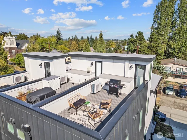 a view of a balcony with chairs