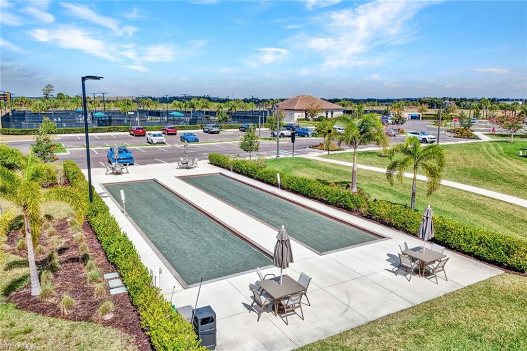 18298 Ridgeline Drive Estero, FL 33928 - Photo 44 of 49 View of property's community featuring a bocce ball area and a patio area