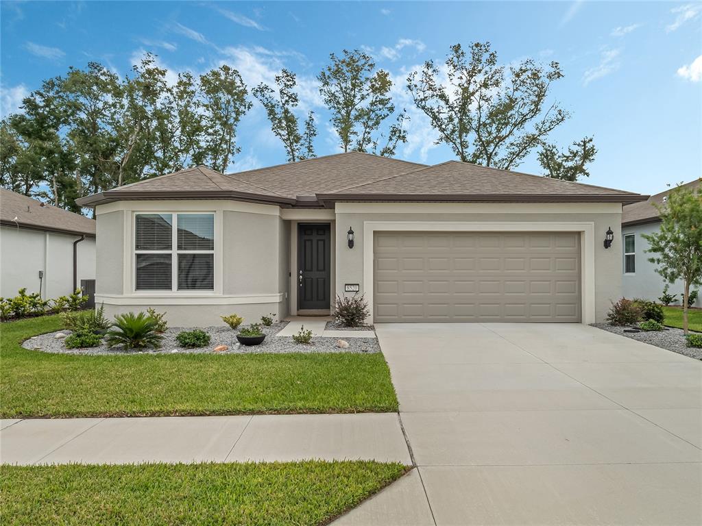 8520 Southwest 52nd Lane Road Ocala, FL 34481 - Photo 1 of 1 front view of a house with a small yard
