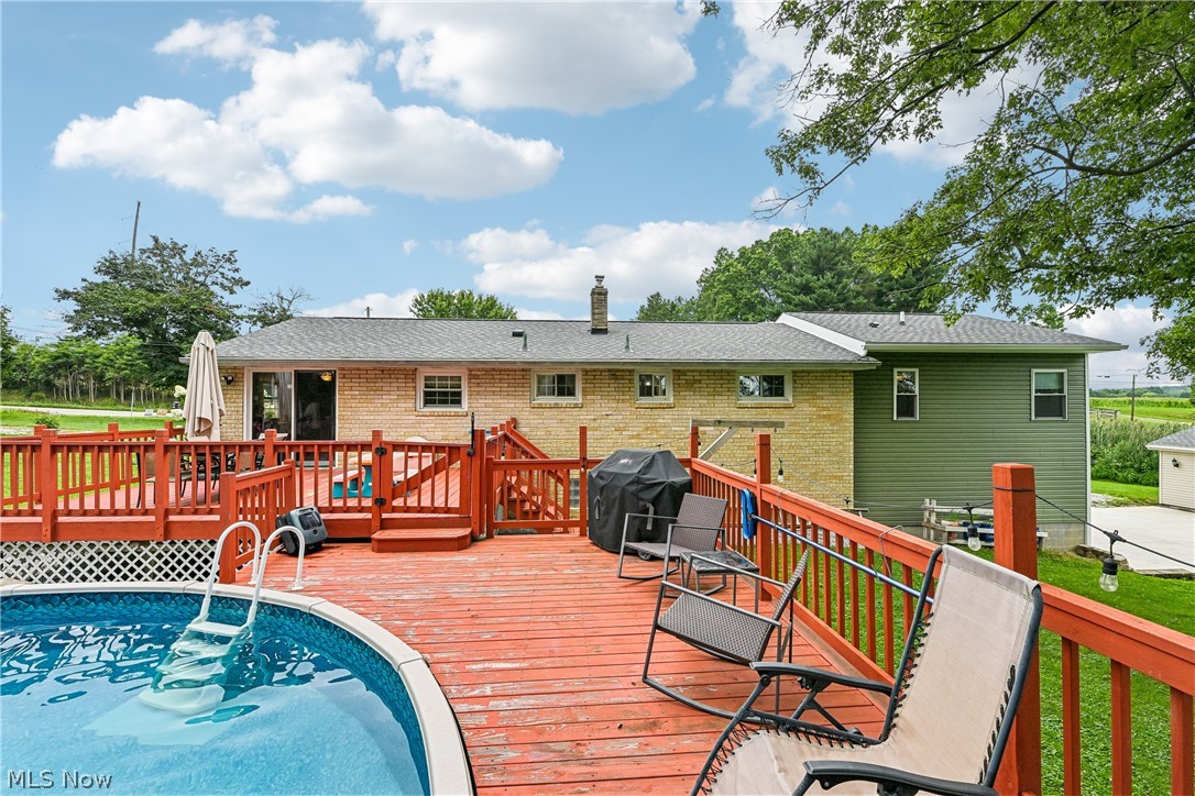 15111 Mt Eaton Road North Rittman, OH 44270 - Photo 35 of 50 Pool and spacious wooden deck
