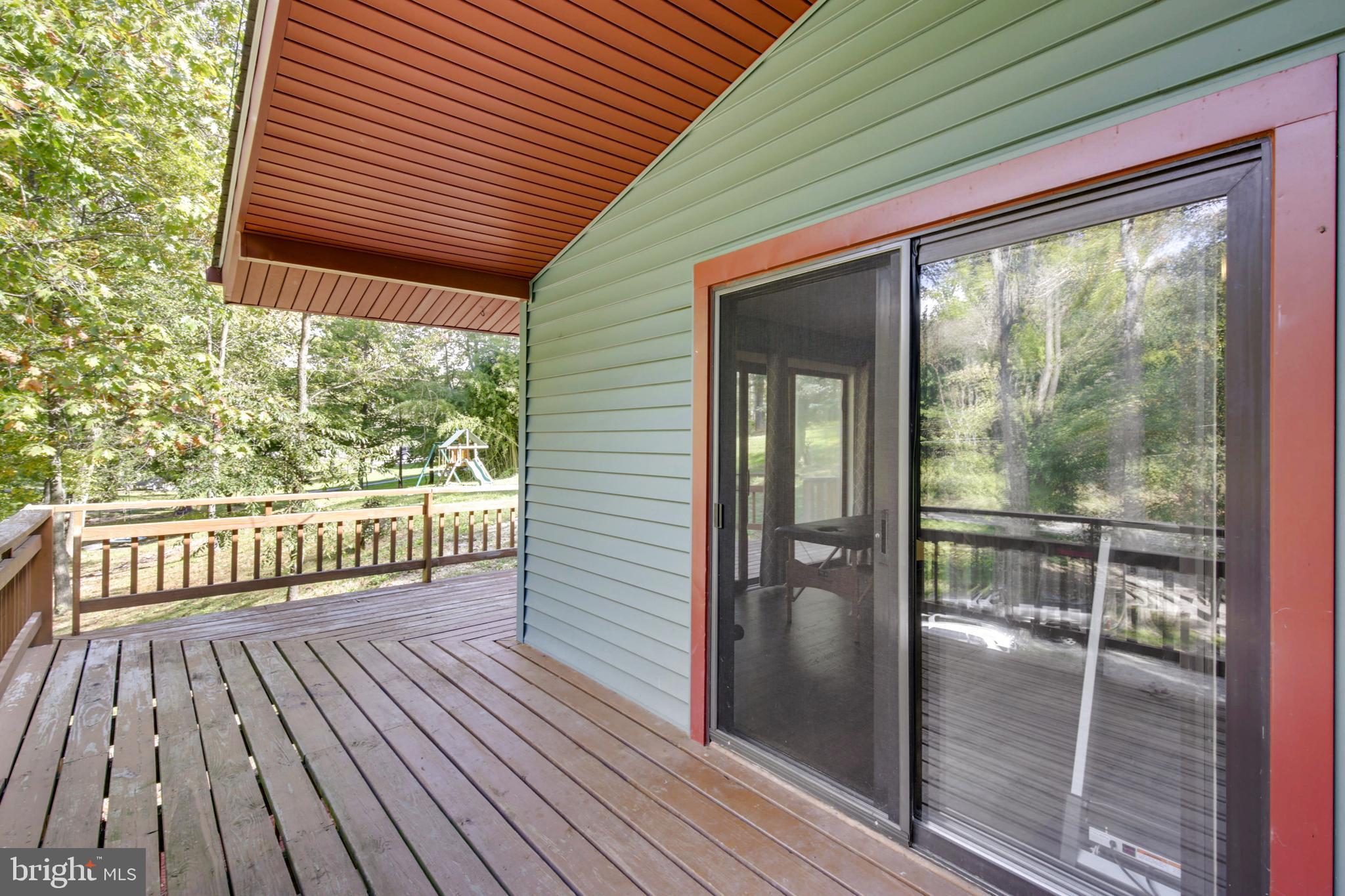 4151 Bill Moxley Road Mount Airy, MD 21771 - Photo 38 of 54 LOWER WRAP AROUND DECK