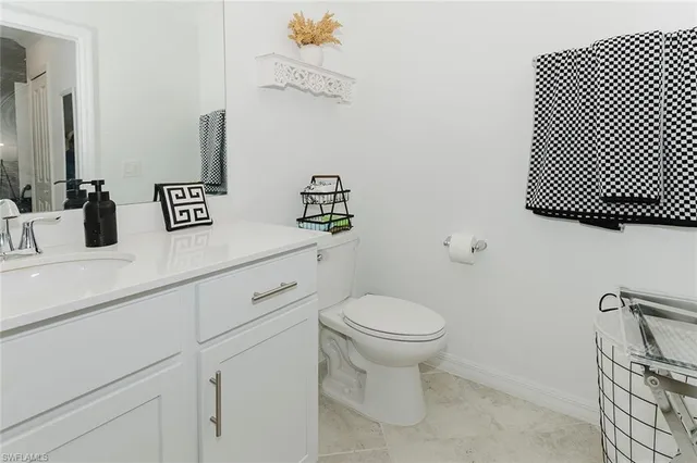 a bedroom with a bed and a closet