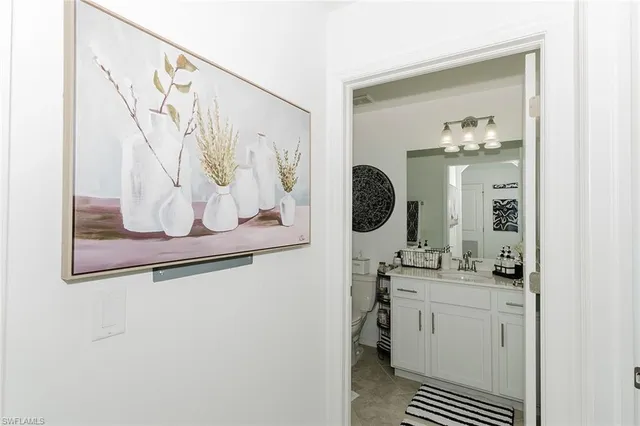 a bed room with a bed and a television