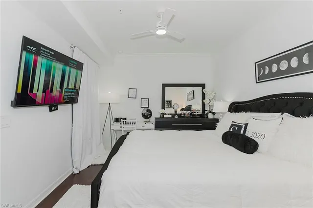 a bedroom with a bed and a walk in closet