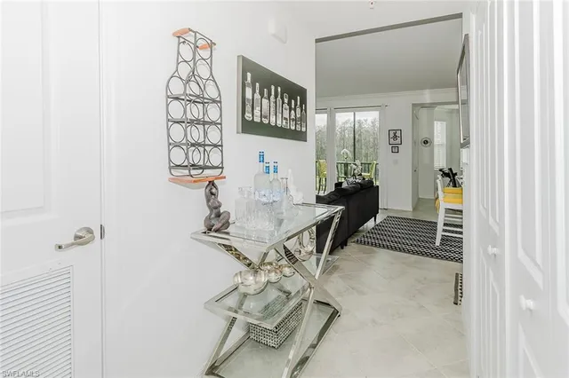 a kitchen with a sink appliances and cabinets
