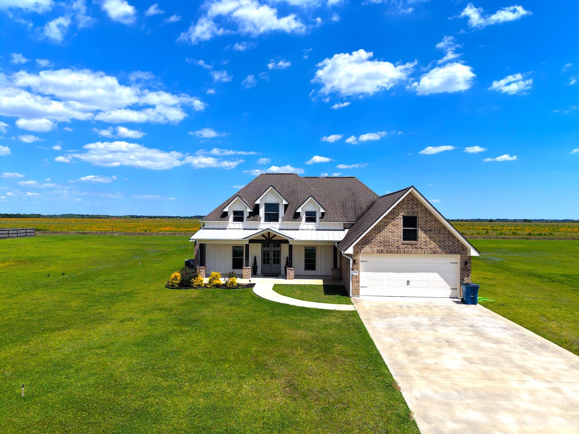 2295 Diamond D Lane Beaumont, TX 77713 - Photo 27 of 40 a front view of a house with a garden