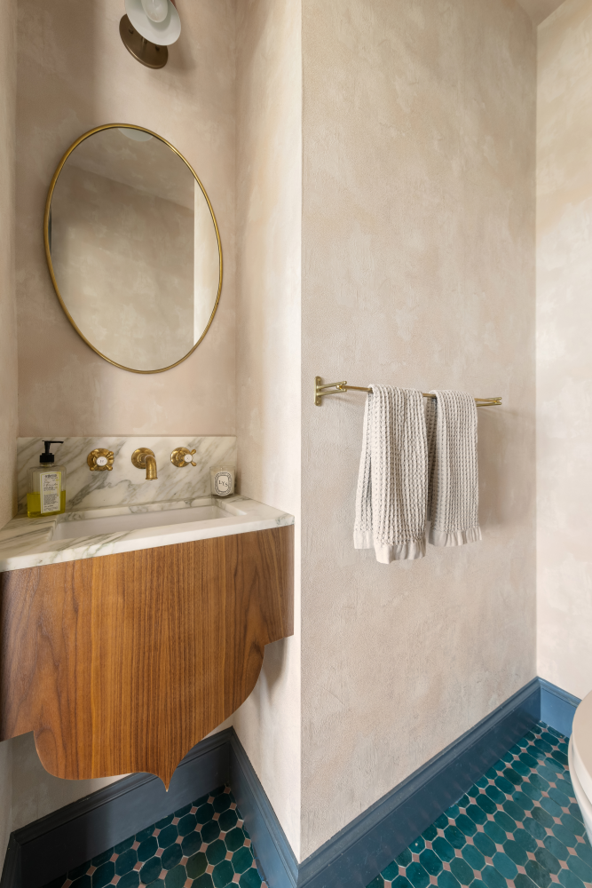 15 Jones Street, Unit 6A Manhattan, NY 10014 - Photo 11 of 28 a bathroom with a sink and a mirror