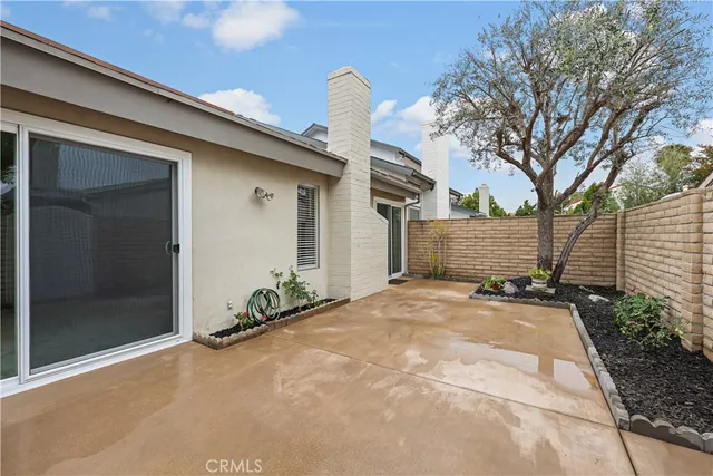 a front view of a house with patio