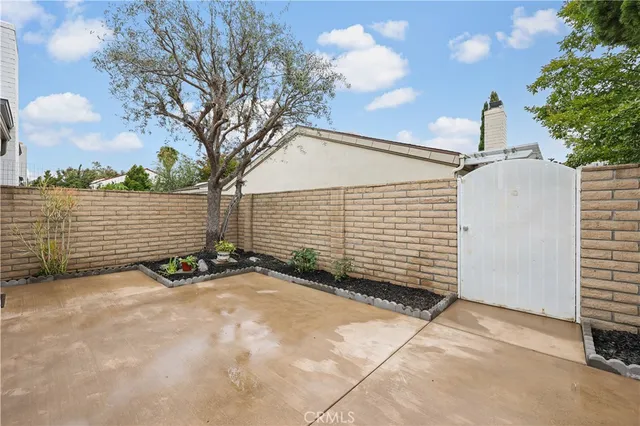 a view of a back yard of the house