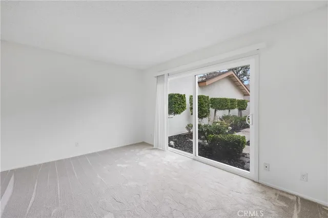 a view of a room with a sliding door