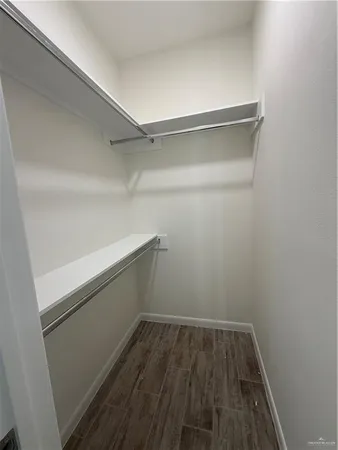 a view of an empty walk in closet