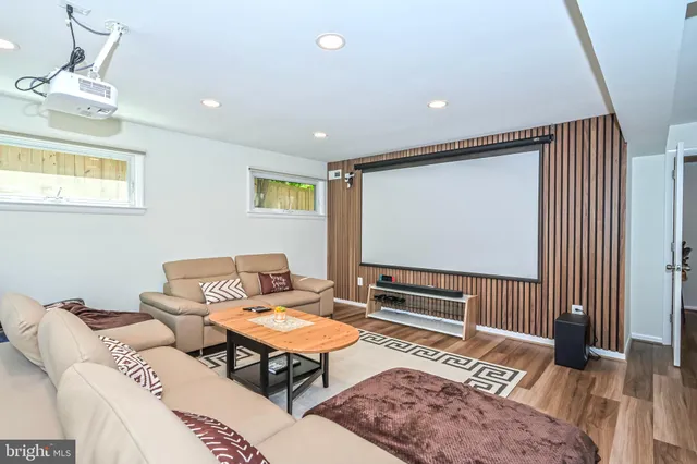 a living room with furniture and a rug