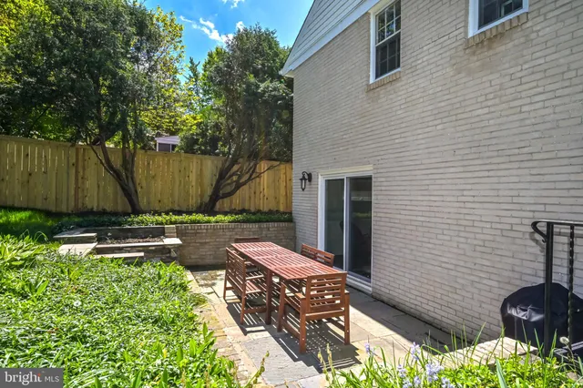 a backyard of a house with seating space