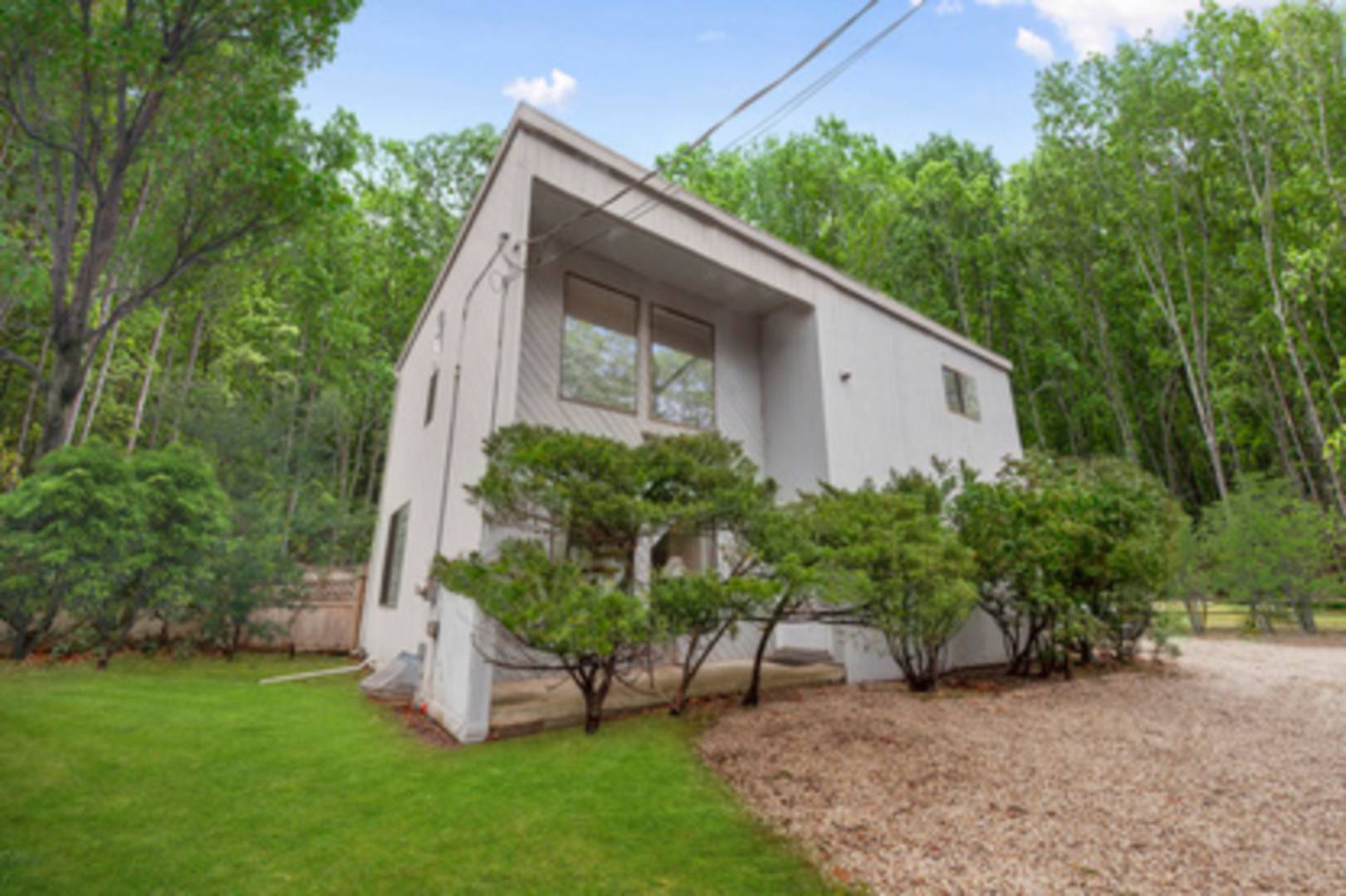 a view of a back yard of the house