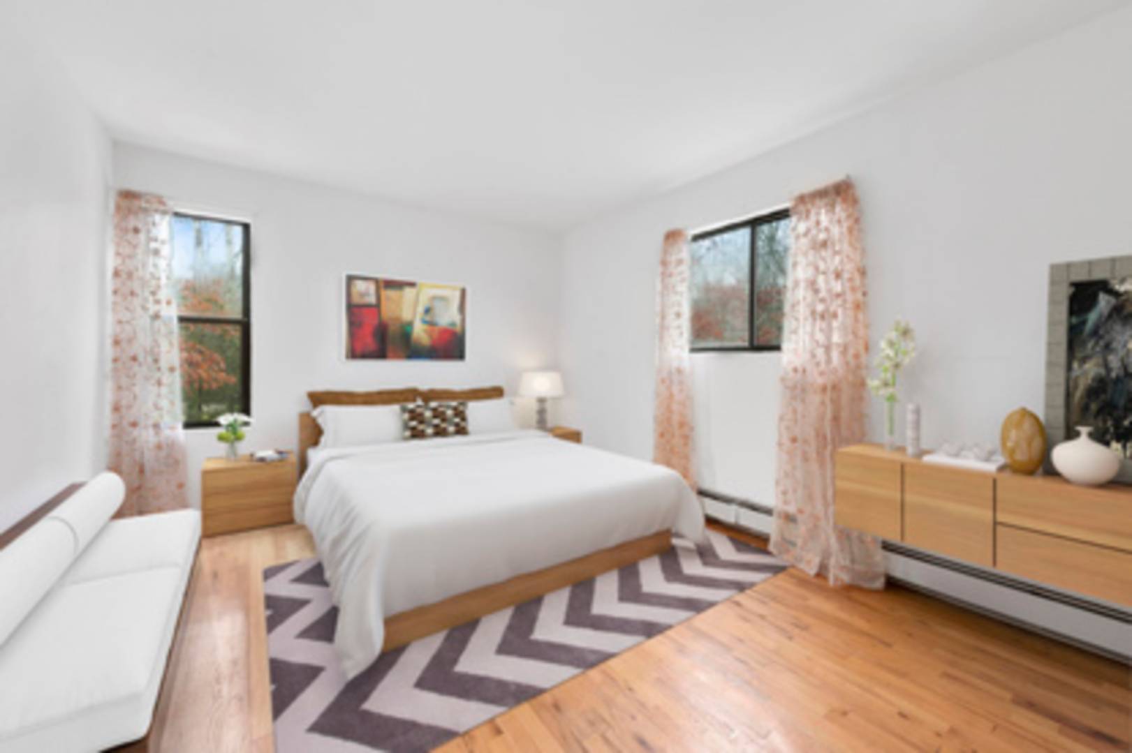 141 Roses Grove Road Southampton, NY 11968 - Photo 7 of 10 a bedroom with a bed and a flat screen tv