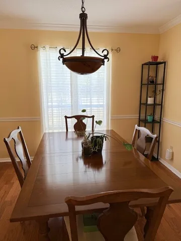 a view of dining room and livingroom with furniture