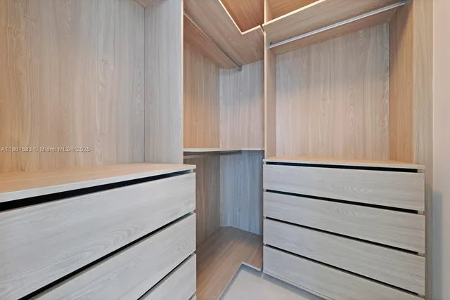 a view of an empty walk in closet