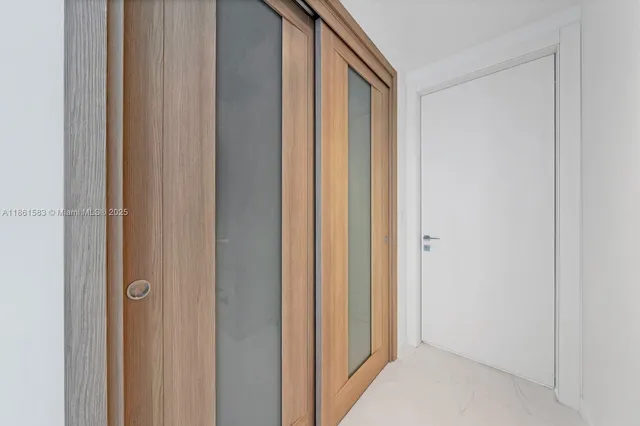 a bathroom with a shower sink and mirror