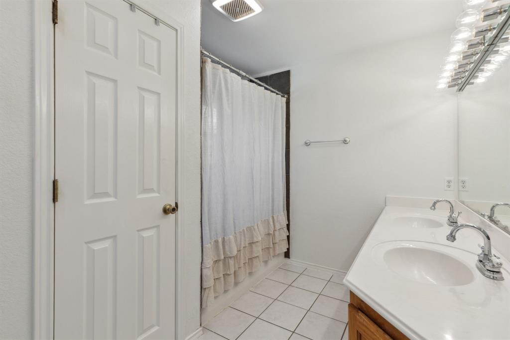 1133 VZ County Road Canton, TX 75103 - Photo 18 of 38 a bathroom with a sink and a mirror