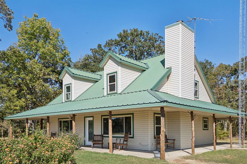 1133 VZ County Road Canton, TX 75103 - Photo 2 of 38 a front view of a house with garden