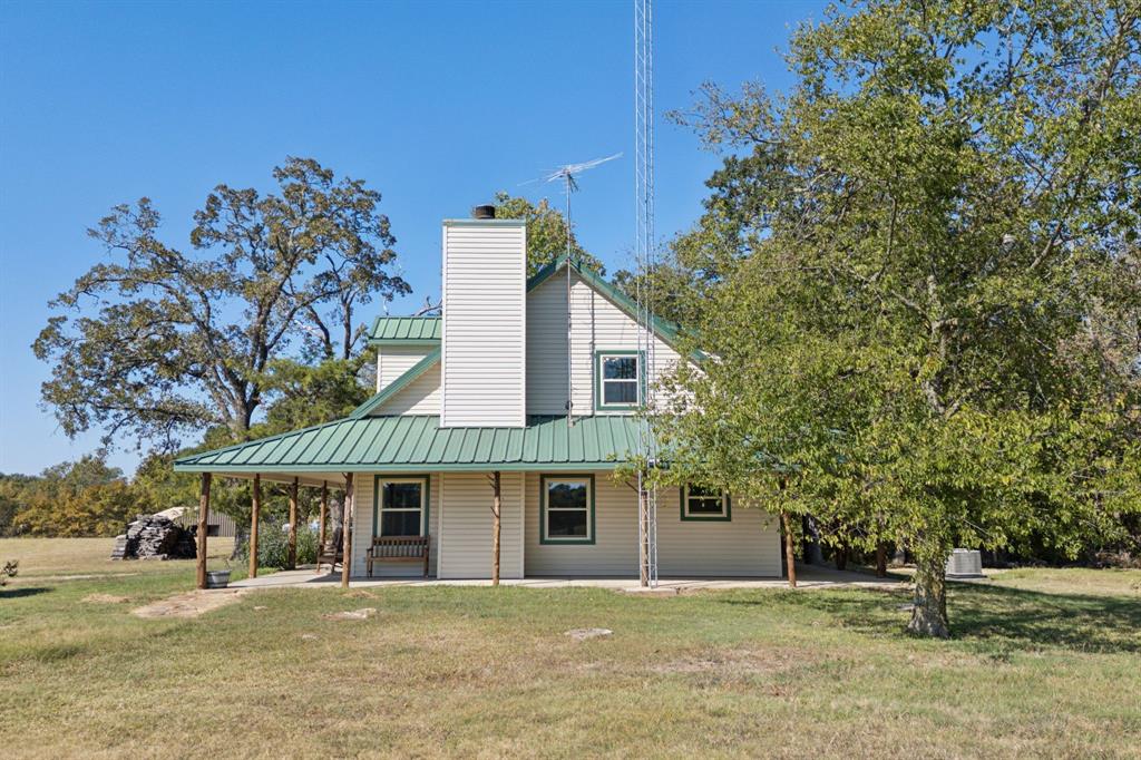 1133 VZ County Road Canton, TX 75103 - Photo 25 of 38 a front view of a house with a garden