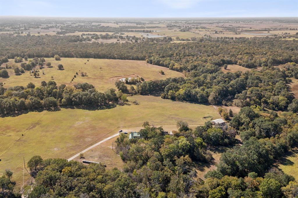 1133 VZ County Road Canton, TX 75103 - Photo 34 of 38 an aerial view of mountain with residential house and ocean view