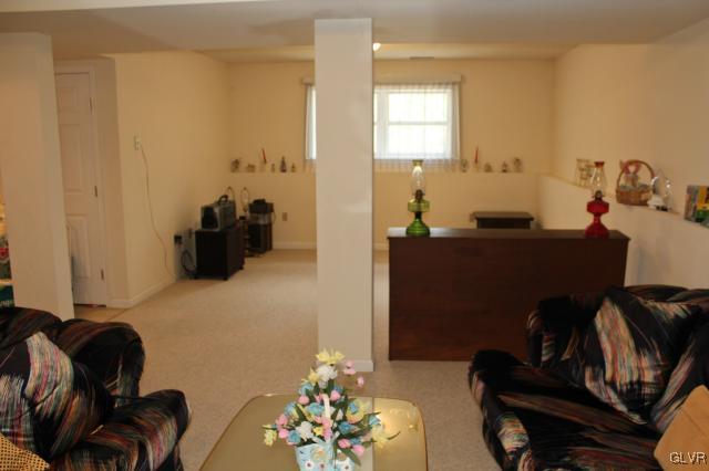 154 Ash Lane Kunkletown, PA 18058 - Photo 14 of 20 a bedroom with a bed and a couch